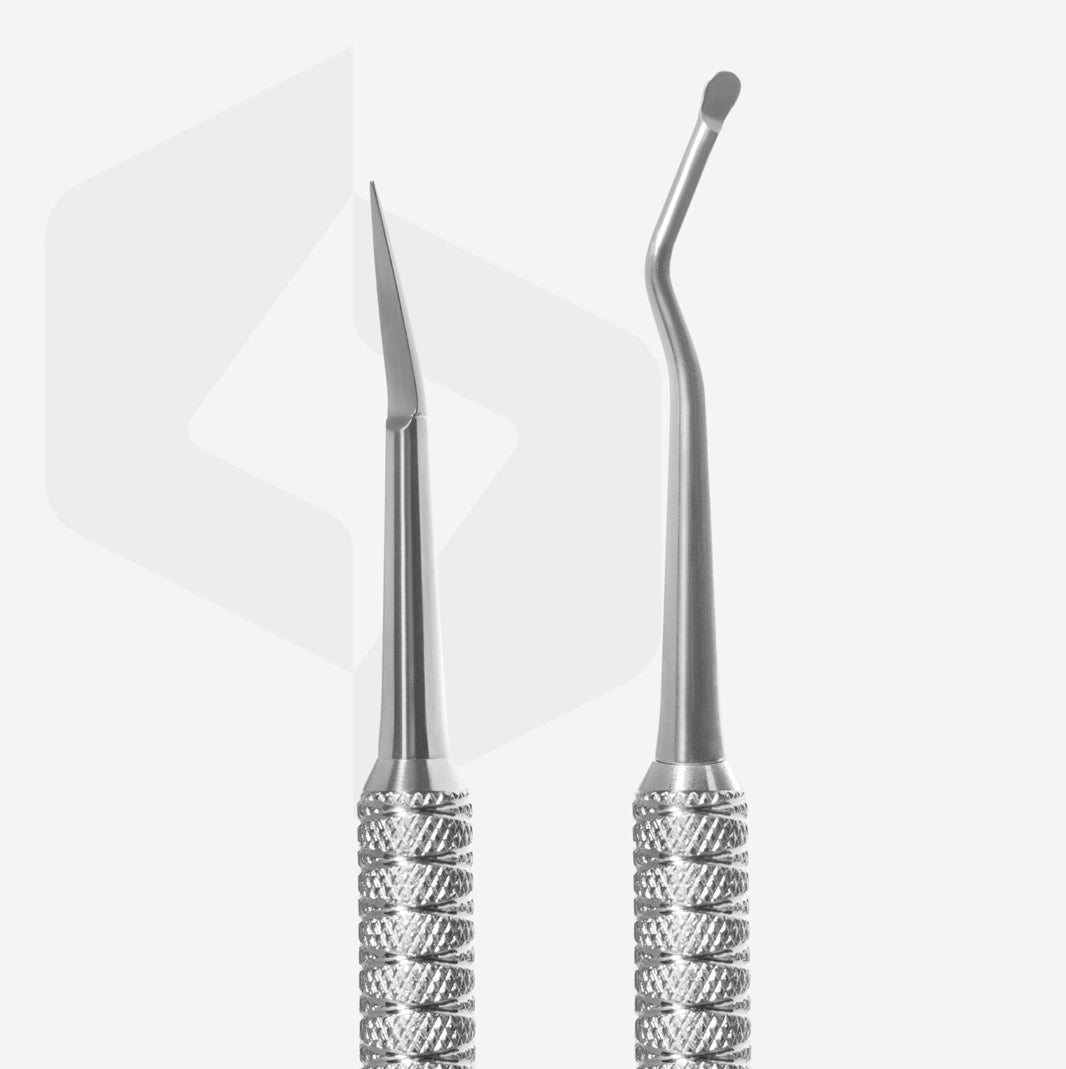 Stainless steel nail art cuticle pusher and nail tool for manicure on white background