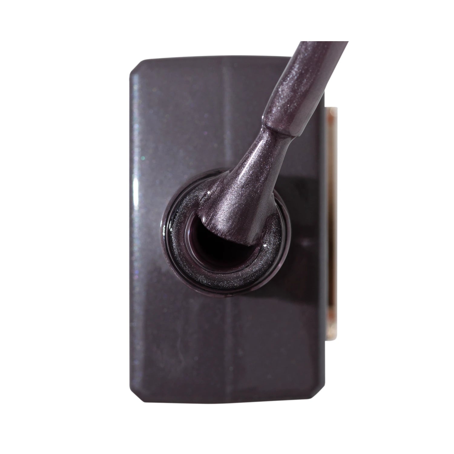 Shimmery dark purple gel nail polish bottle with brush applicator, professional manicure