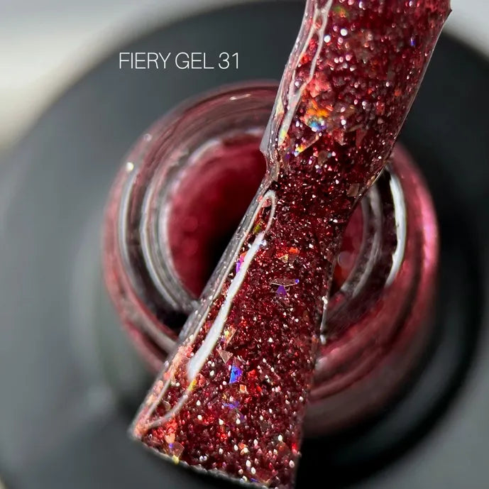 Red glitter Fiery Gel 31 UV gel polish for nails, close-up with shimmer texture