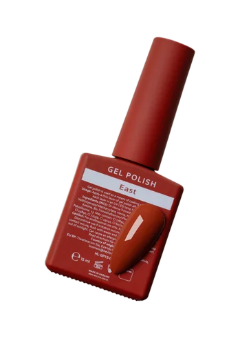 Red gel nail polish bottle labeled 'East' with matching color sample, manicure product.