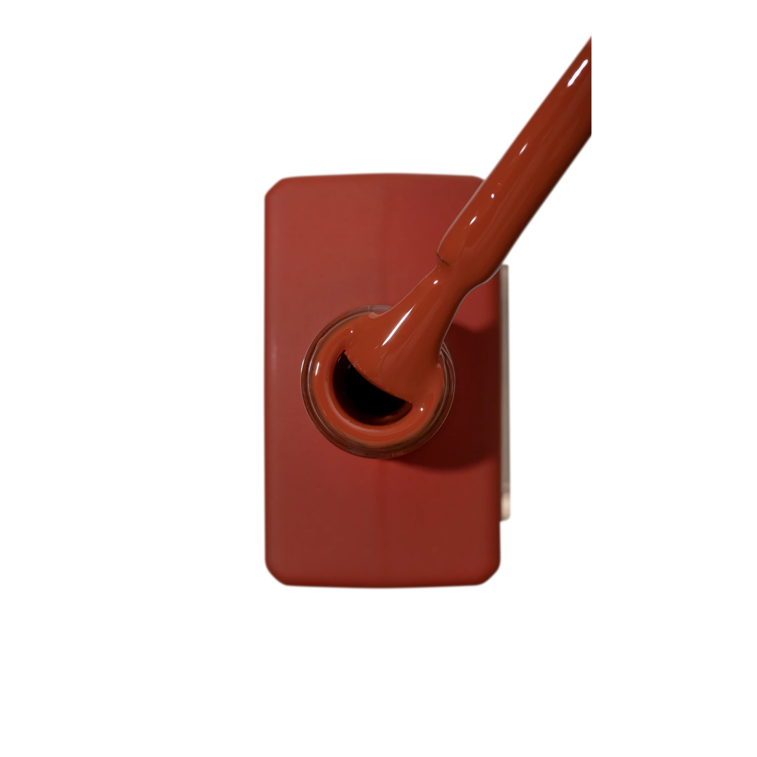 Rich brown nail polish bottle with brush, professional manicure UV gel