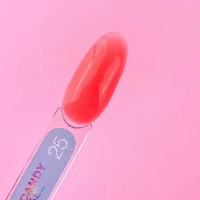 Red UV extension gel swatch on plastic stick, labeled 25, shown against pink background