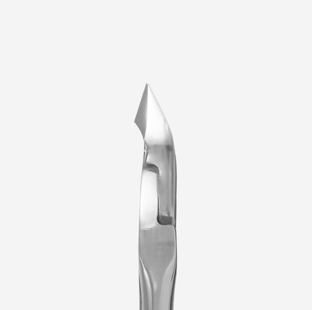 Stainless steel cuticle pusher with angled tip for manicure and nail care