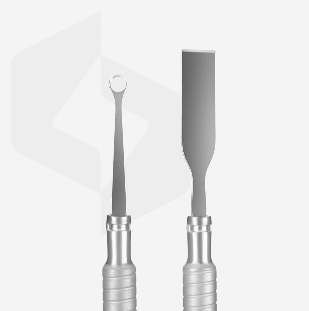 Stainless steel cuticle pusher and manicure tool on white background, professional nail care