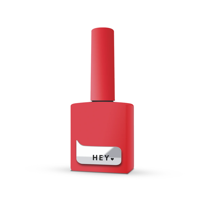 Red gel nail polish bottle with &