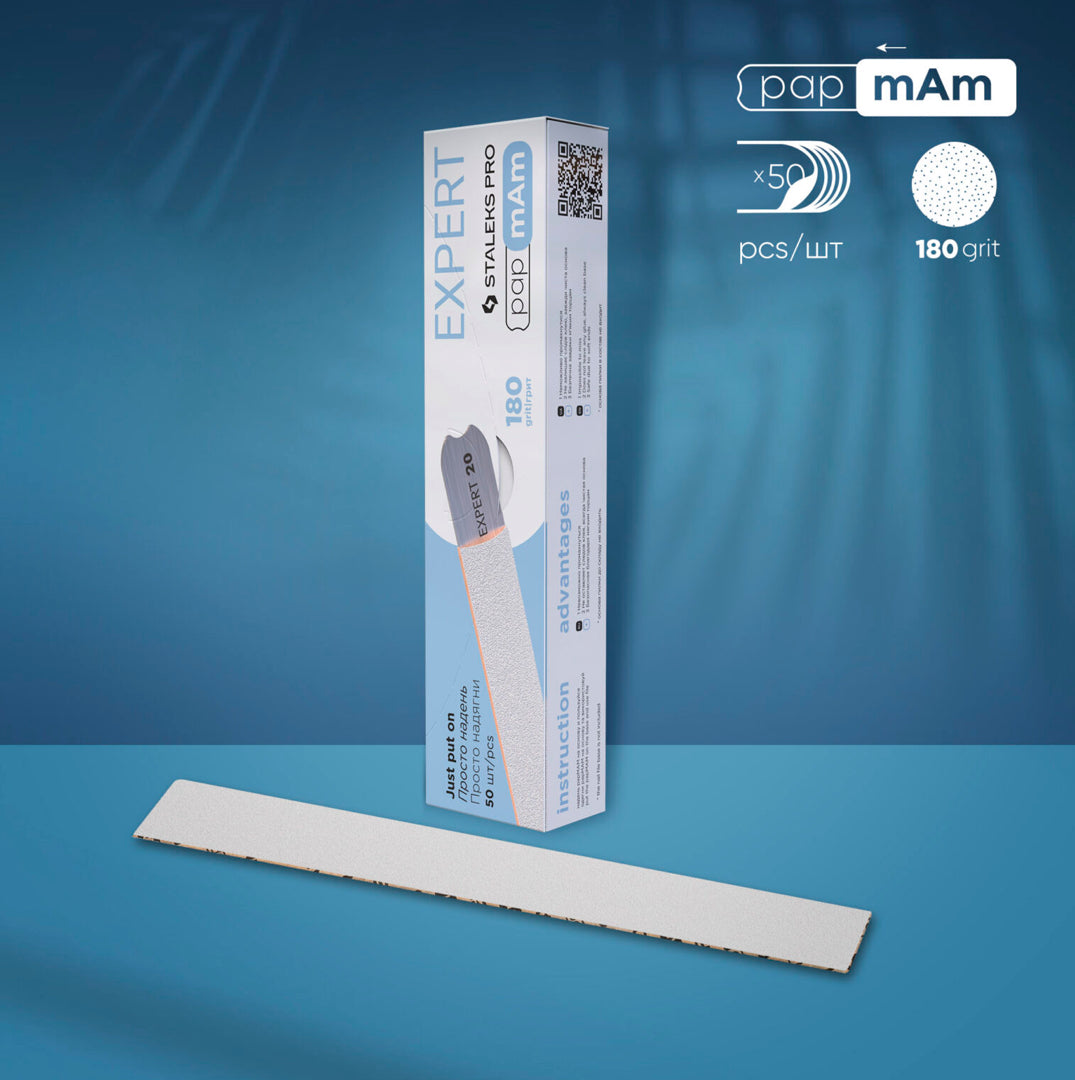Staleks Pro Expert 180 grit nail file refill pads with packaging, manicure tool on blue background
