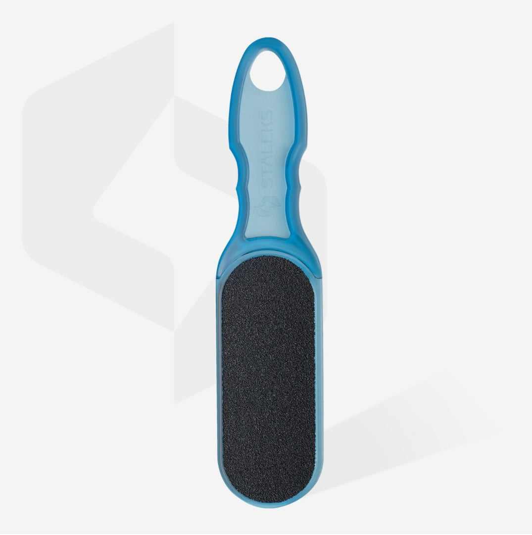 Blue handle foot file for pedicure with coarse black abrasive surface on white background.