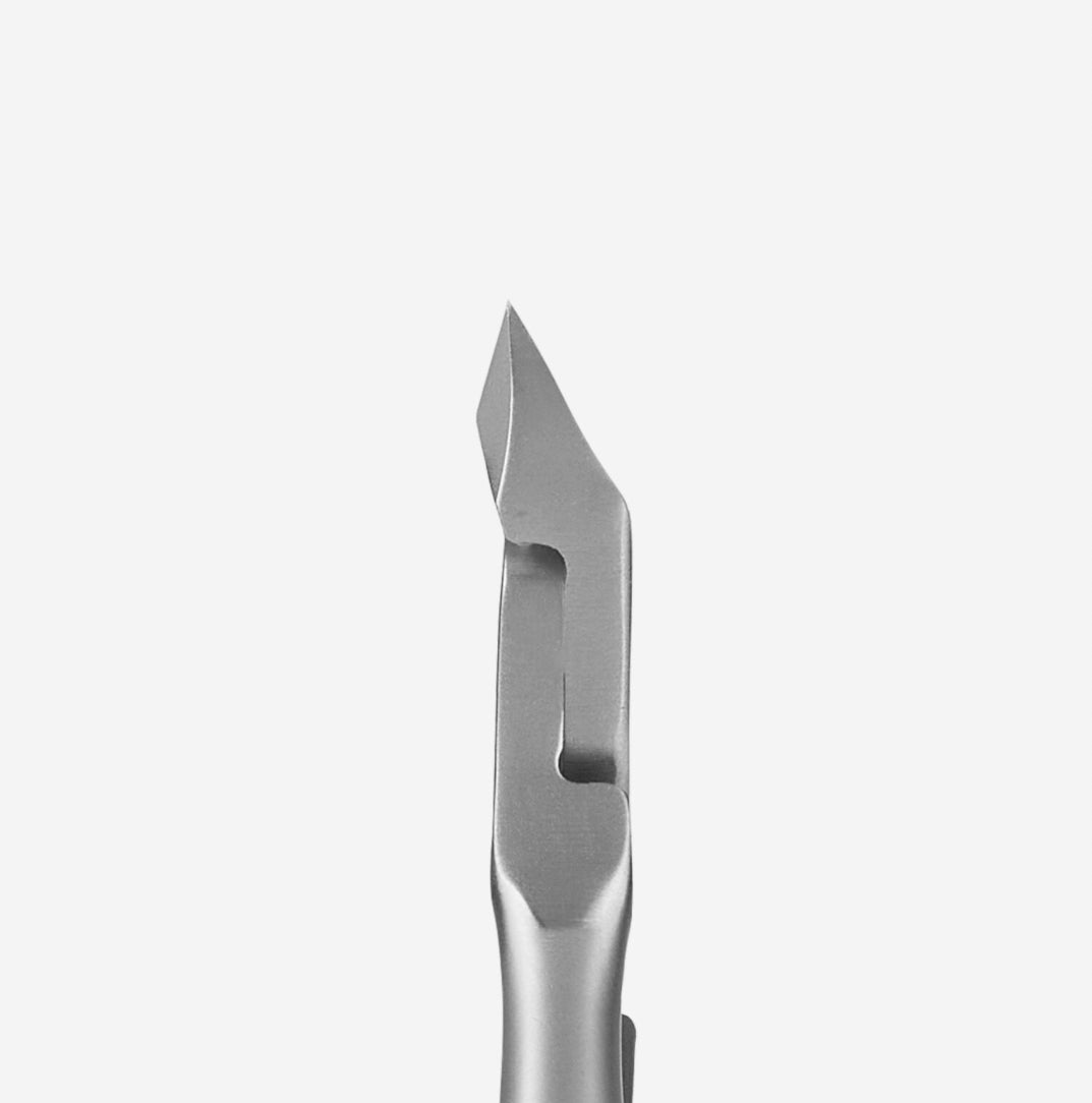 Stainless steel cuticle remover tool for professional nail care on white background
