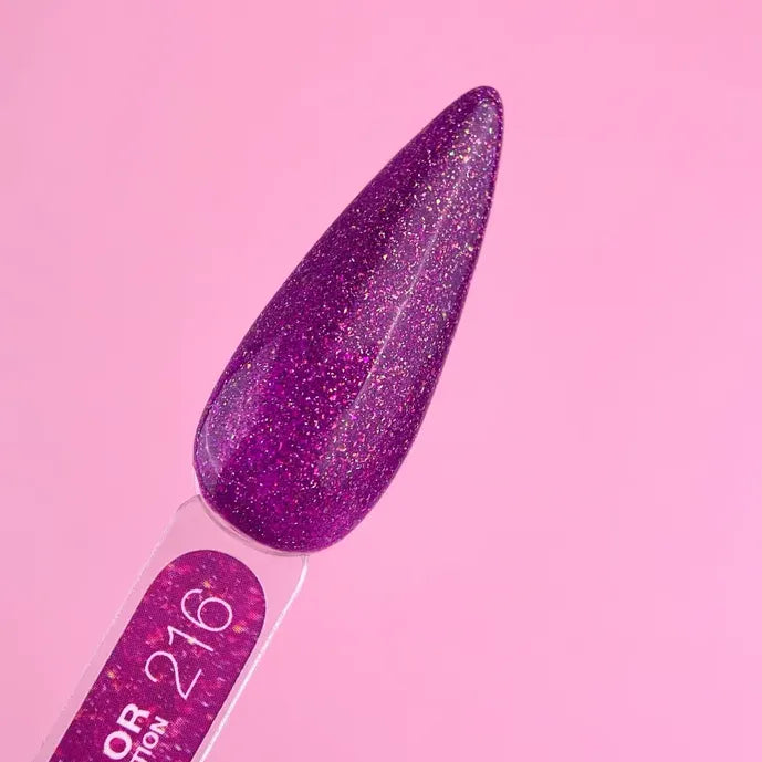 Purple glitter gel nail polish swatch on a sample stick against a pink background