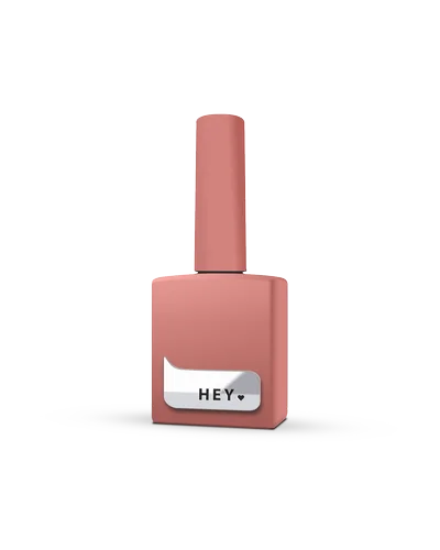 Pink UV gel nail polish bottle with 'HEY' label for manicure