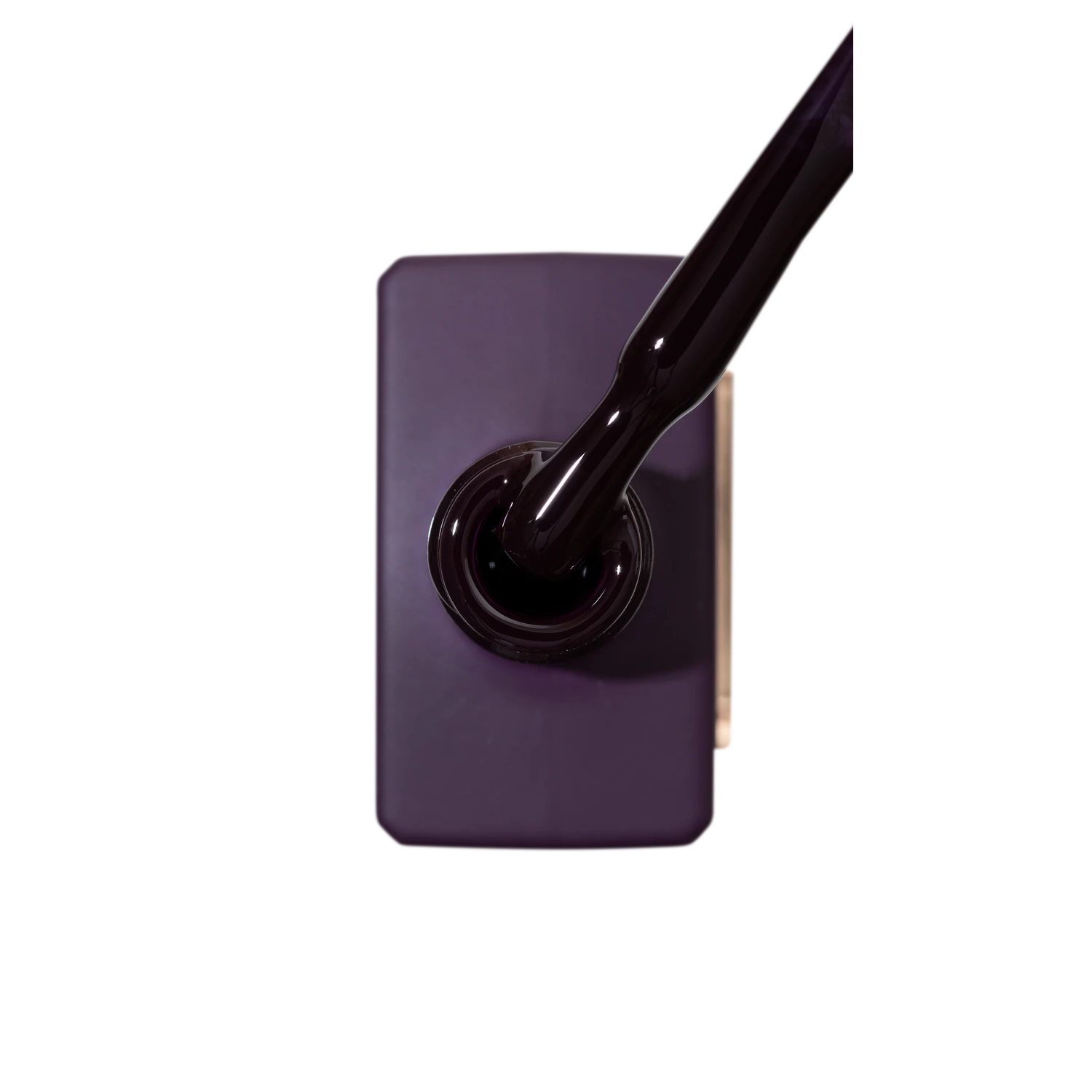 Dark purple gel nail polish bottle with brush, professional manicure product