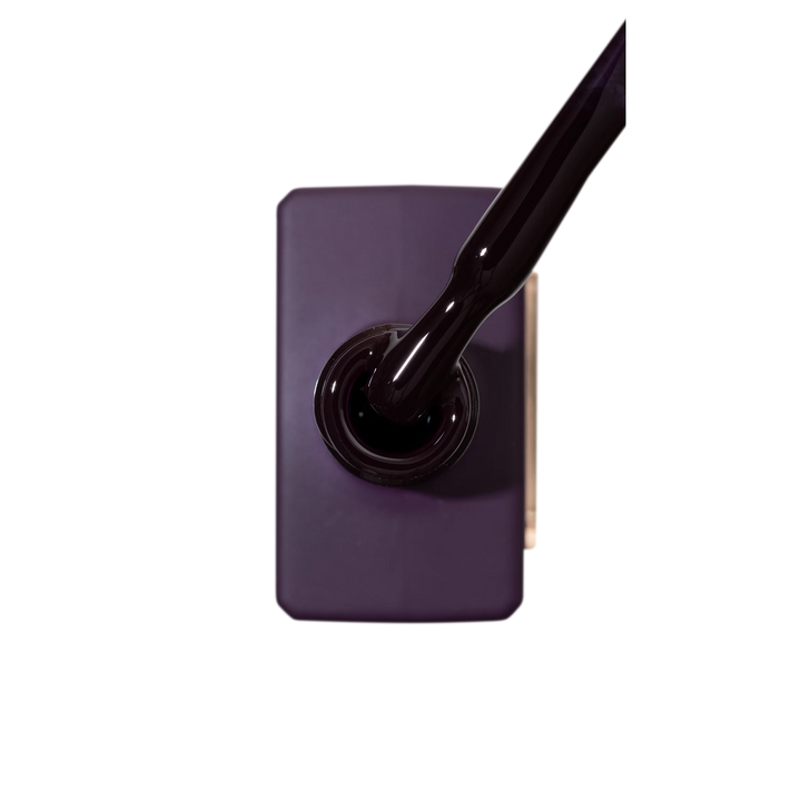 Dark purple gel nail polish bottle with brush, professional manicure product