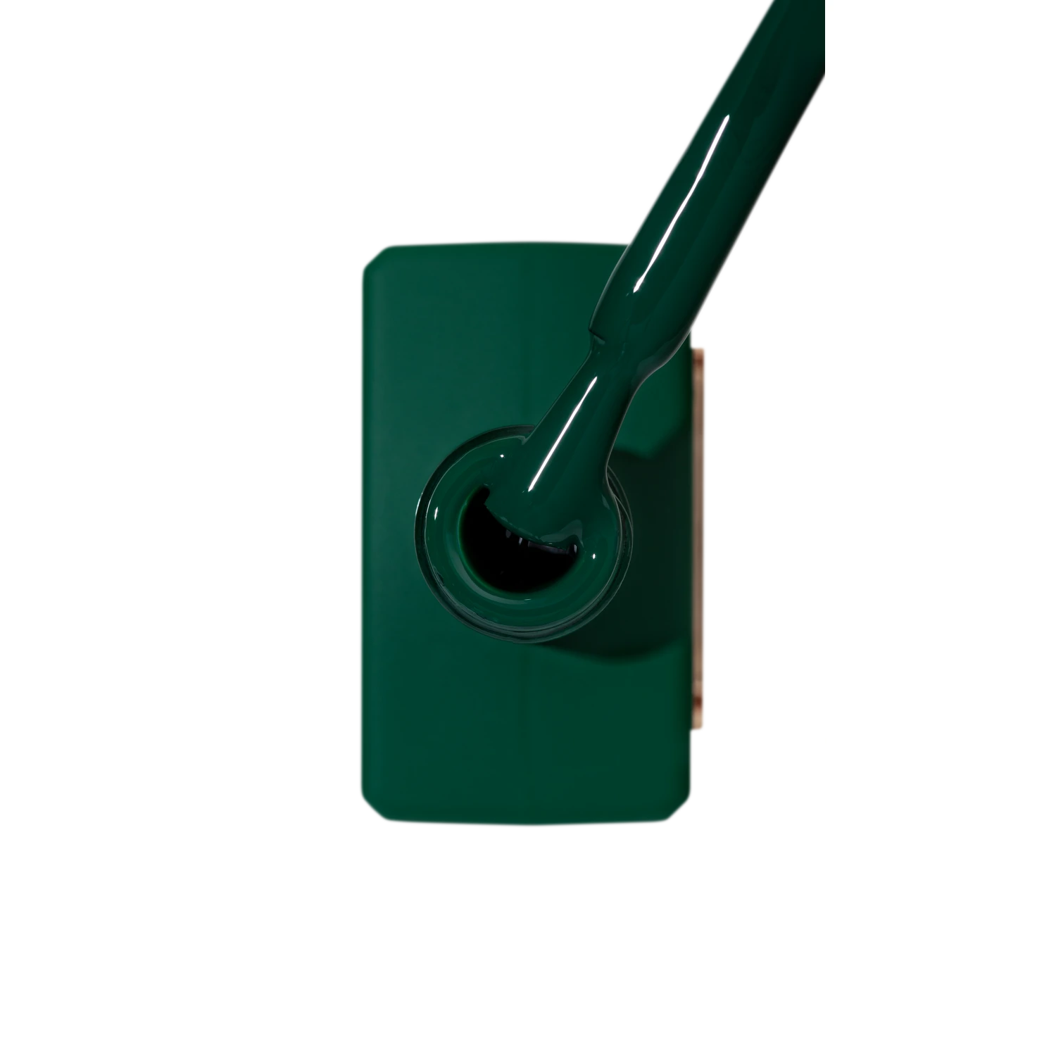 Green gel nail polish bottle with brush applicator, manicure product close-up