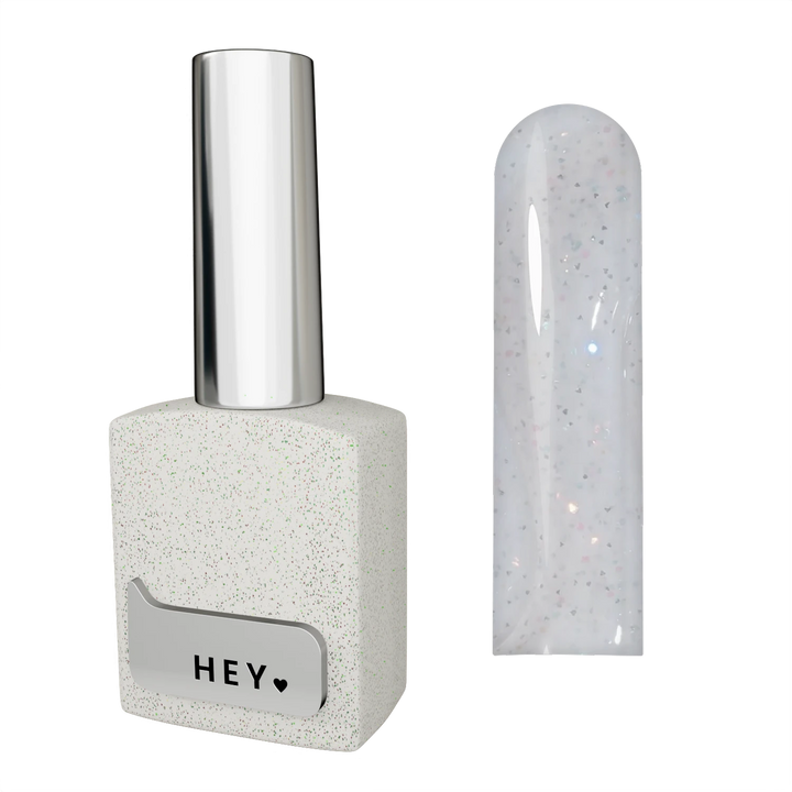 White glitter gel nail polish bottle and swatch with metallic cap on black background