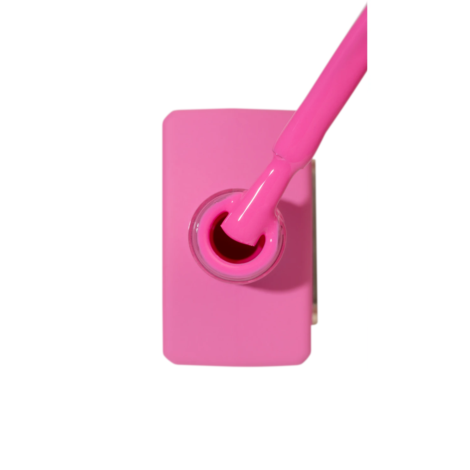 Bright pink nail polish bottle with brush, ideal for manicures and nail art