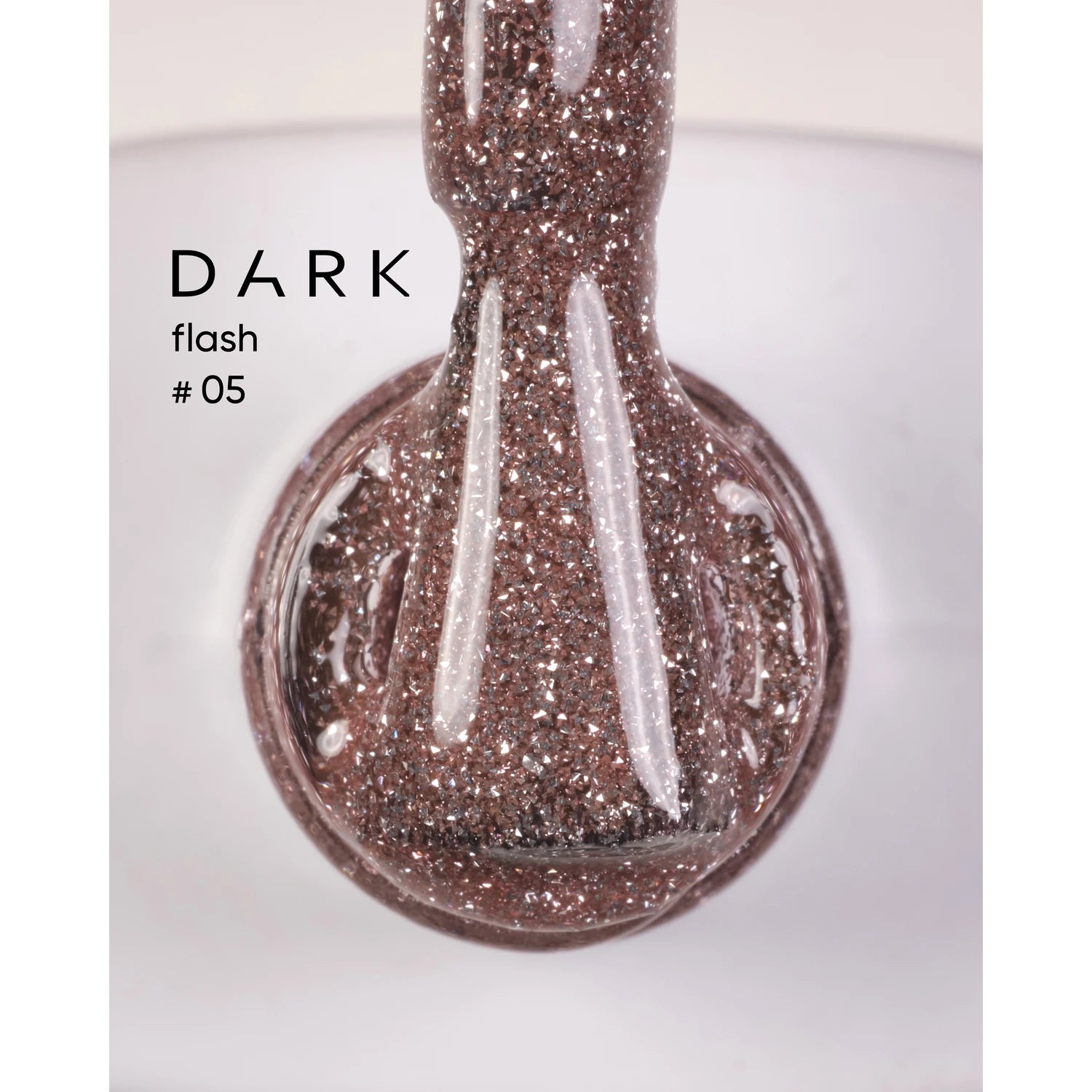 Dark flash #05 glitter gel nail polish with shimmering brown sparkle texture.