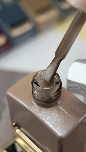 Close-up of a screwdriver being used on a metallic component.
