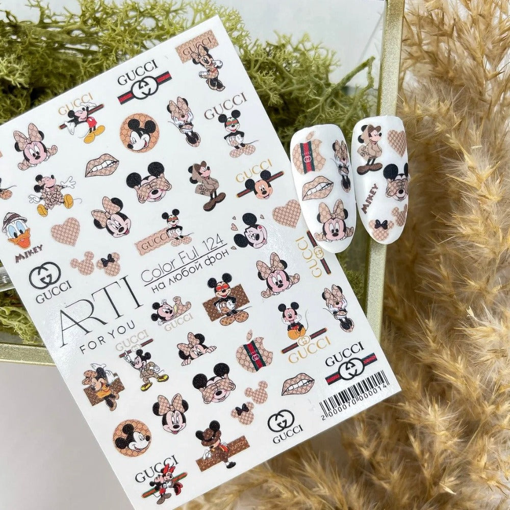 Mickey and Minnie Mouse nail art stickers sheet with nude and brown designs, manicure accessory