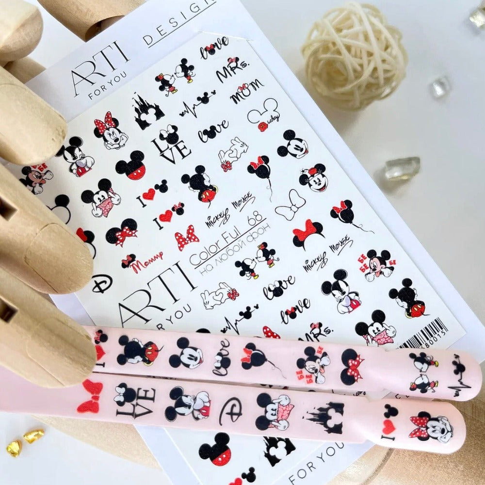 Nail art stickers with cartoon mouse, bows, and love-themed designs for manicure decoration