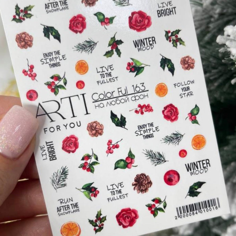 Winter themed nail art stickers with flowers, holly, pine branches, and motivational quotes