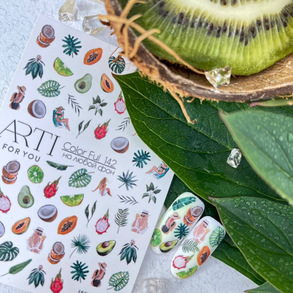 Colorful tropical fruit and leaf nail art stickers with decorated nail tips, kiwi and leaves.