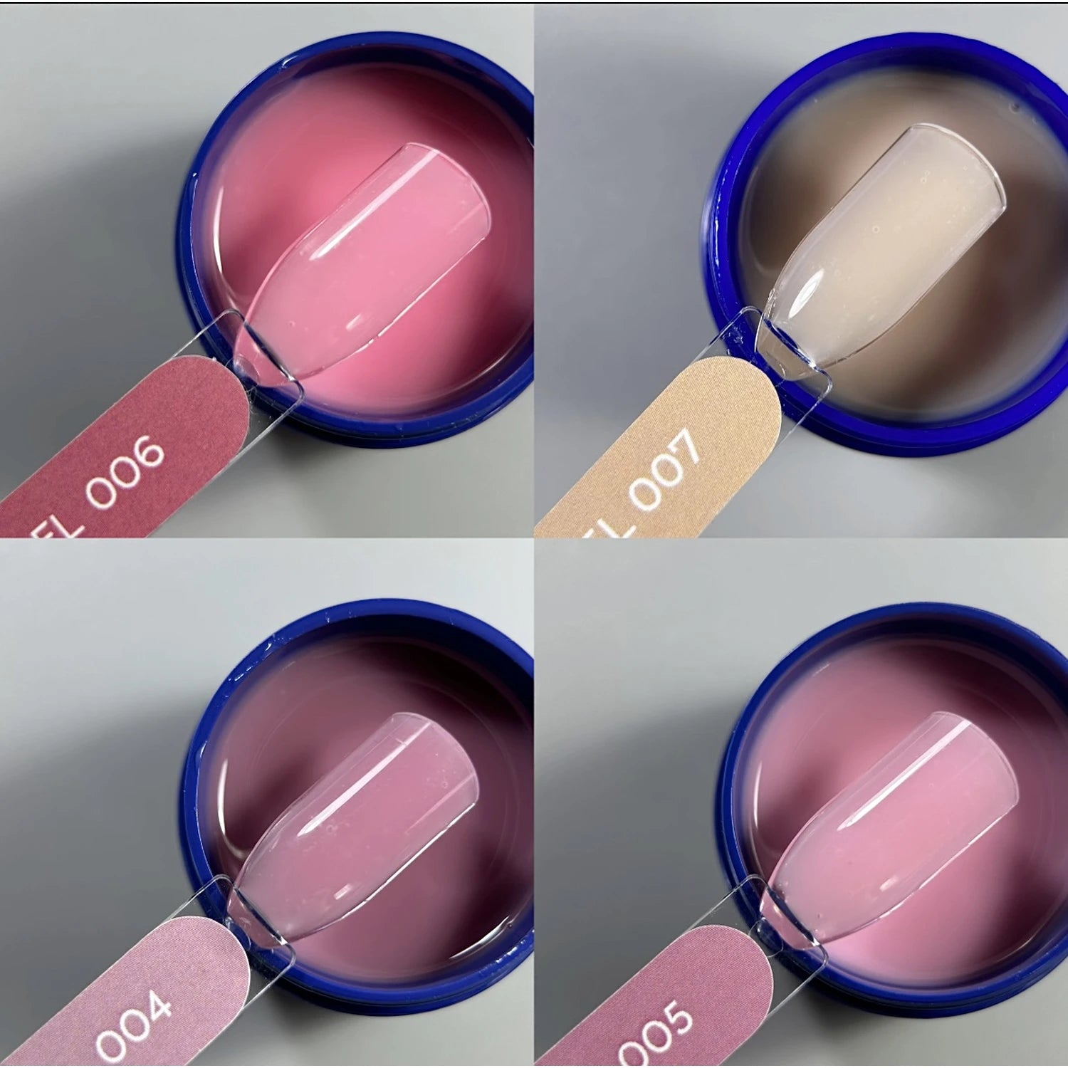 Four gel nail polish color samples in blue jars, showcasing pink and nude manicure shades
