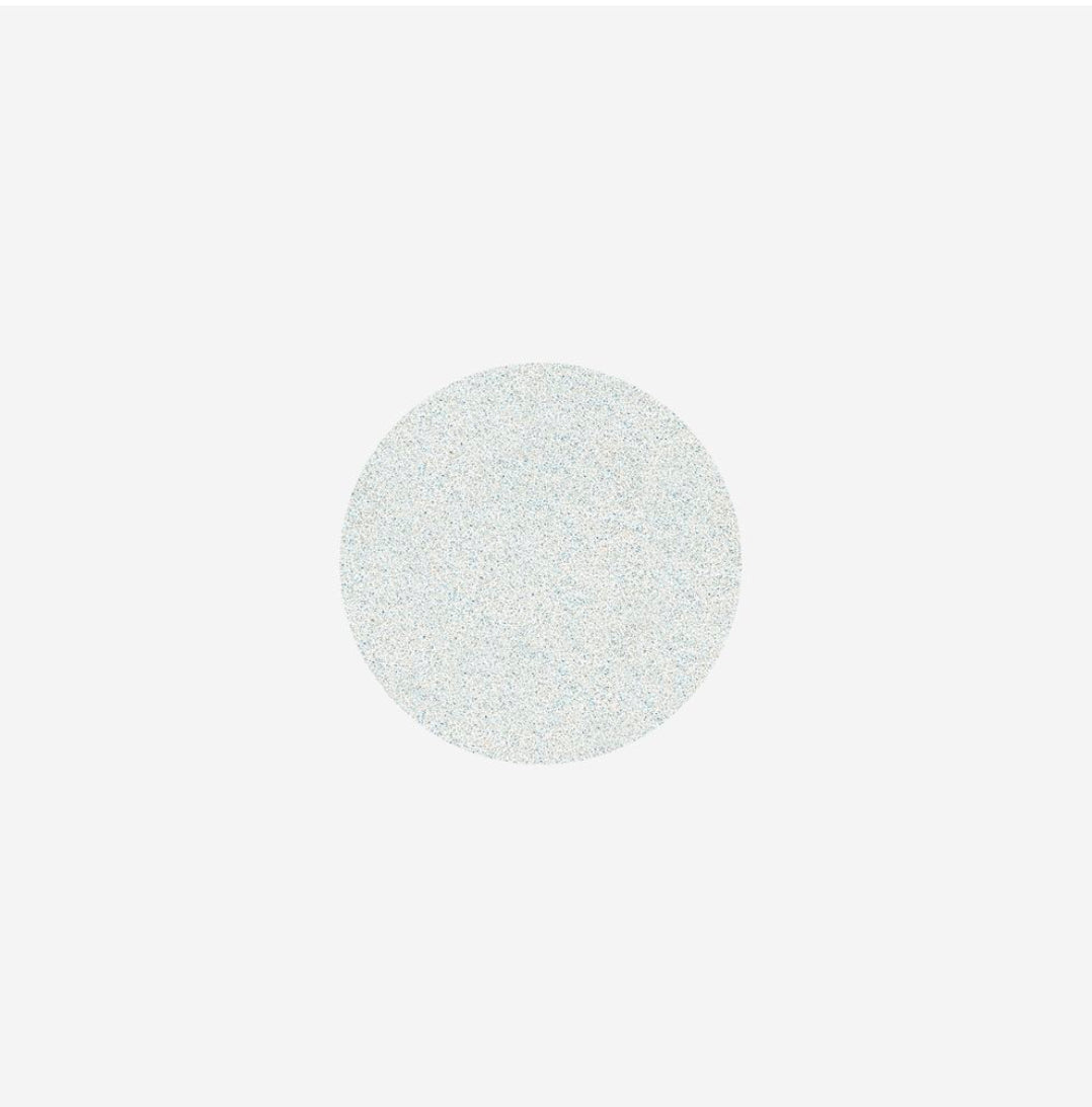 Holographic silver glitter nail powder for manicures and nail art on white background
