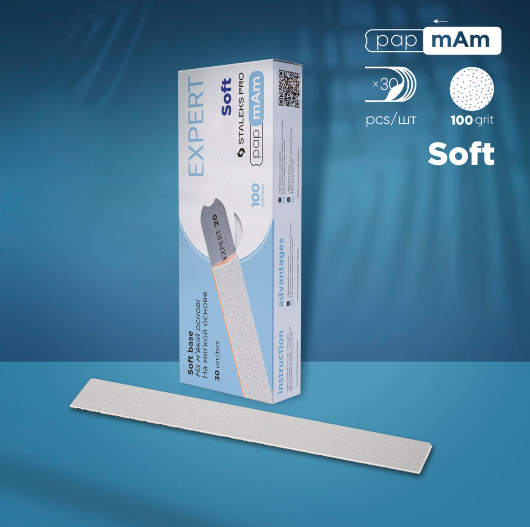 Professional nail file 100 grit soft base with box, manicure accessory on blue background