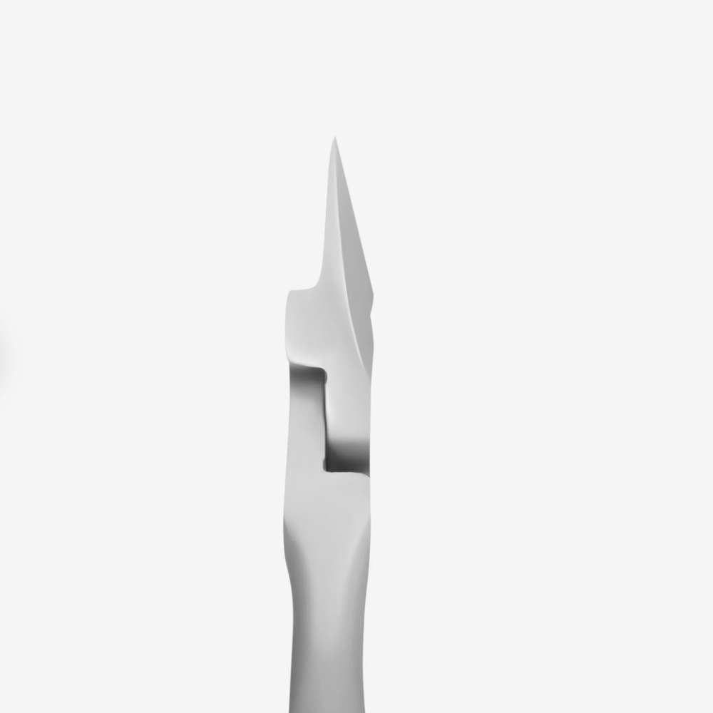 Stainless steel cuticle nipper tip for manicure and pedicure close-up on white background.