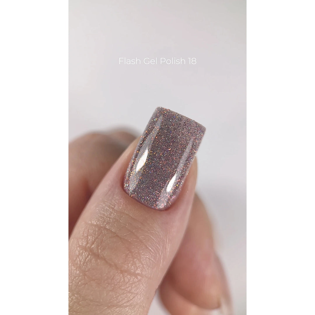 Hand with short square nail painted in glittery pink Flash Gel Polish 18, close-up