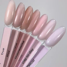 Nude and pastel pink gel nail polish sample sticks for manicure and pedicure