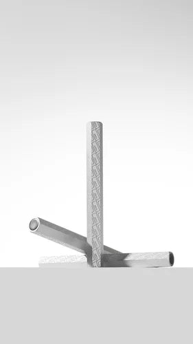 Three silver nail art tools with textured grip, arranged on a white background