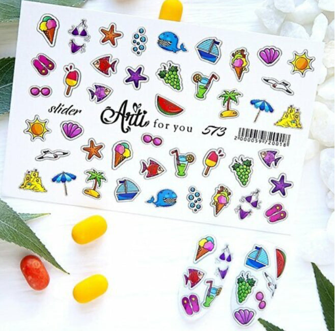 Colorful summer-themed nail art stickers with ice cream, sunglasses, fruits, and beach icons.