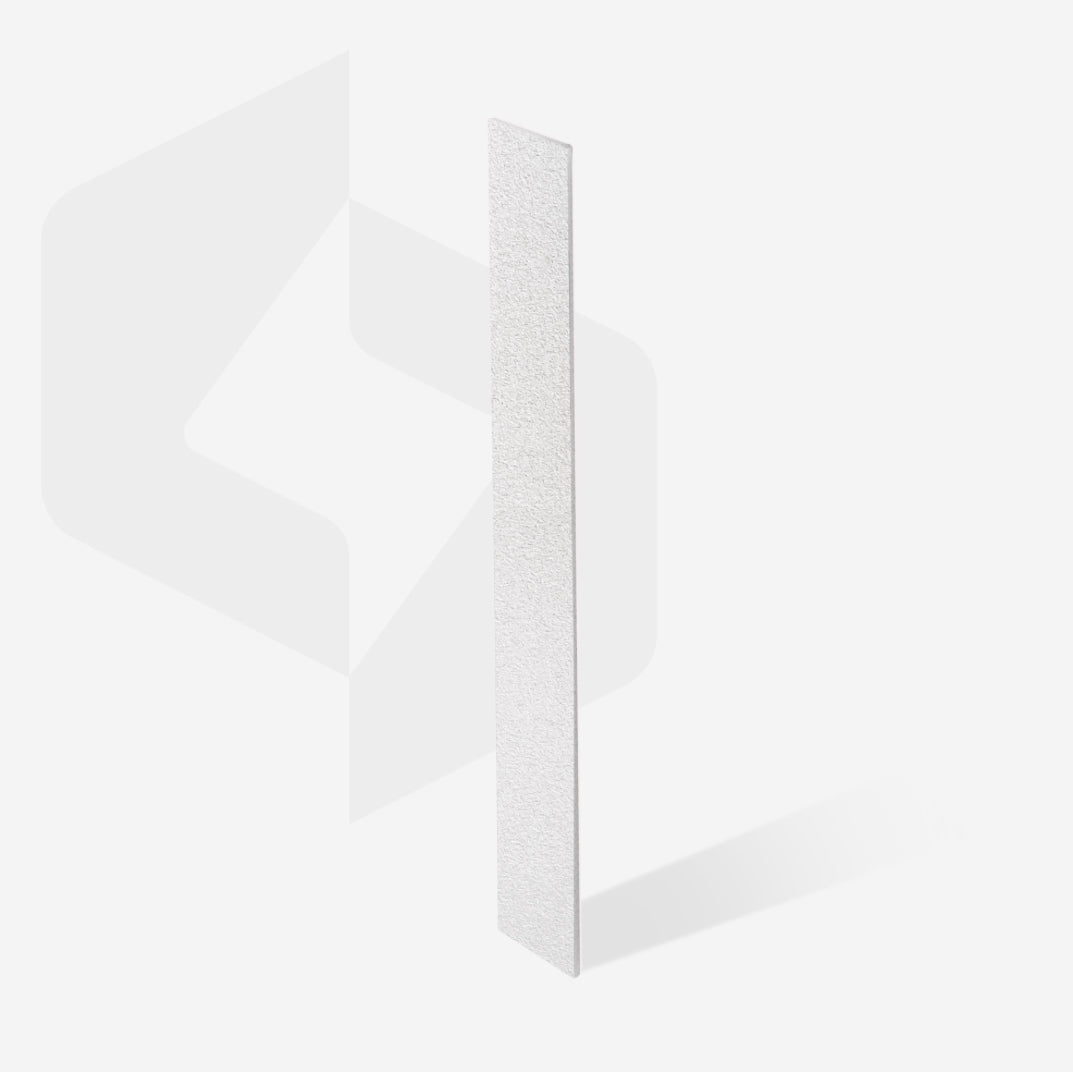 White nail file for professional manicure on a plain background