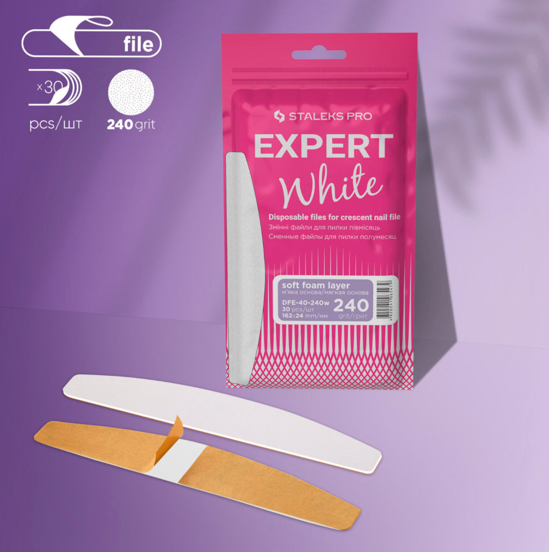 Staleks Pro Expert White disposable crescent nail file refills, 240 grit, 30 pieces on purple background