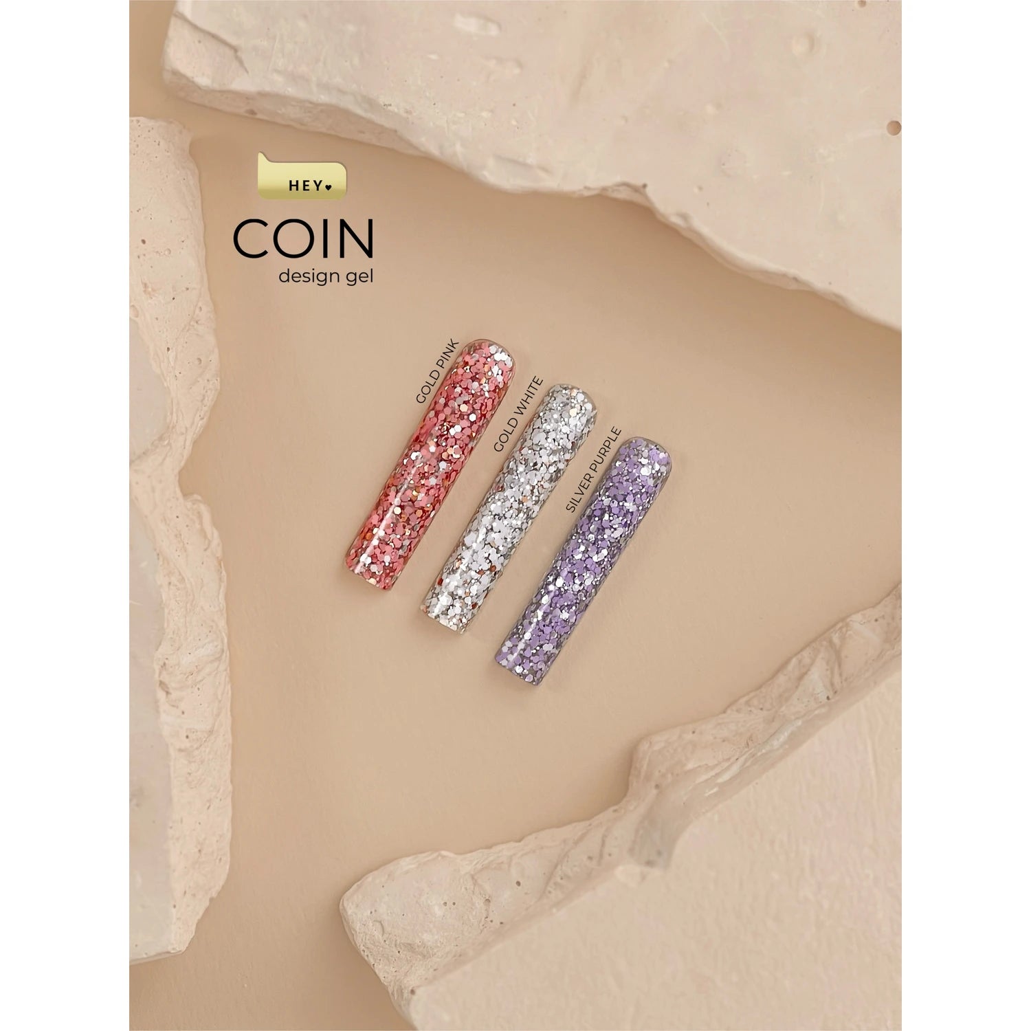 Glitter nail design gel swatches in pink, white, and purple on neutral background