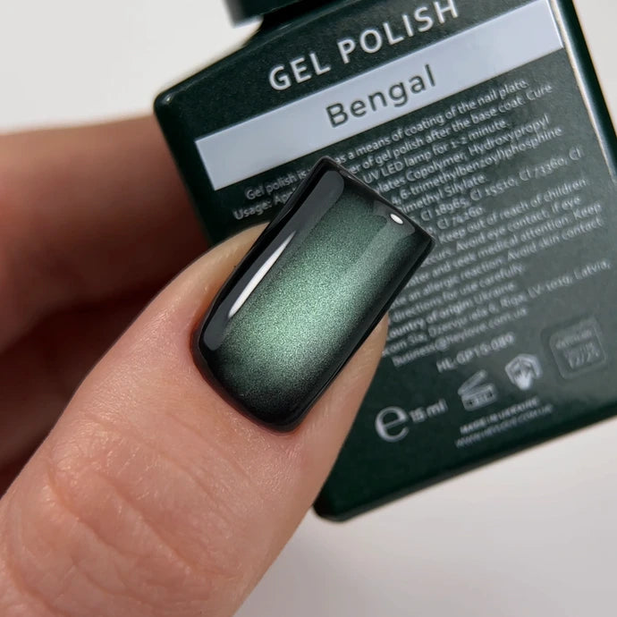 Close-up of a fingernail painted with shimmery dark green gel polish, labeled 'Bengal'.