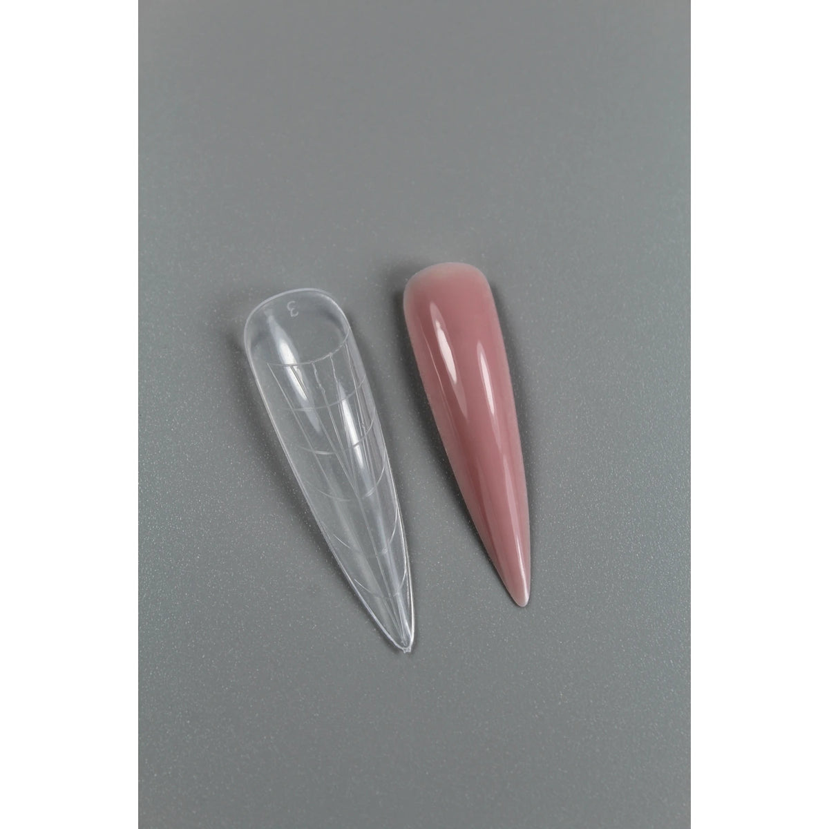 TOUCH Upper Forms Stiletto – upper form next to a finished stiletto nail