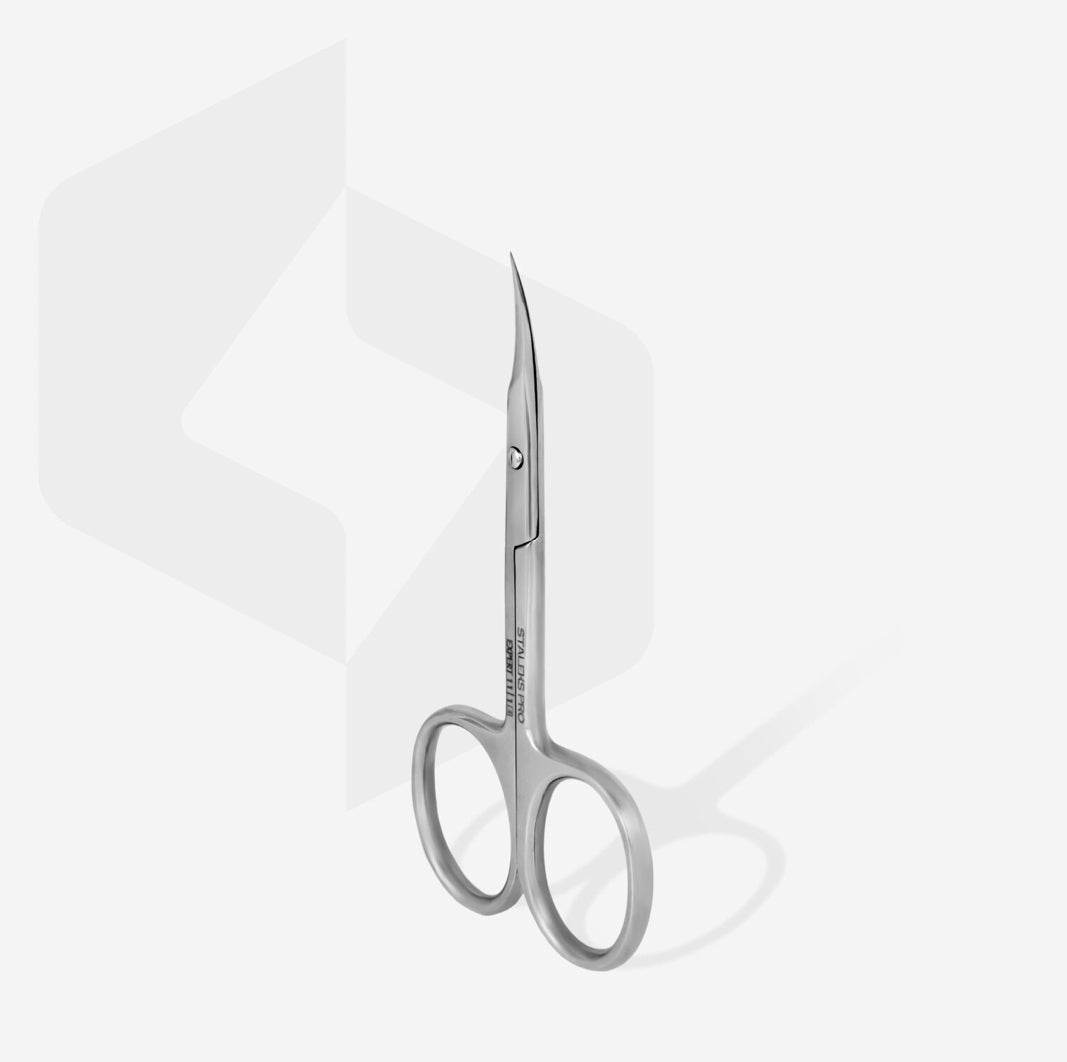 Stainless steel curved manicure scissors for nail and cuticle care on white background