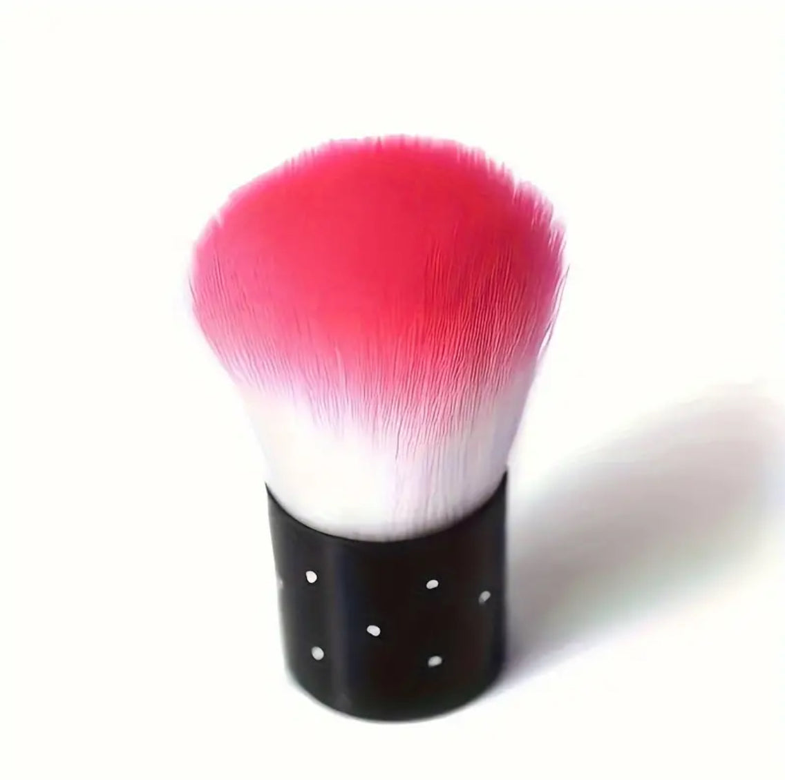 Pink and white nail dust brush with black handle, manicure accessory on white background