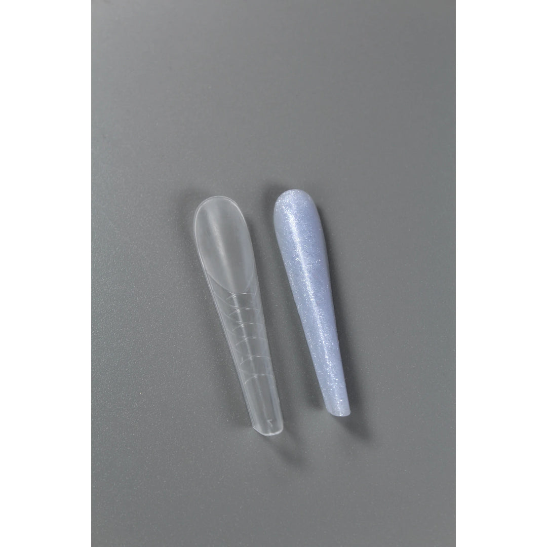 TOUCH Extension Tips Almond Medium – clear tip next to a finished almond nail