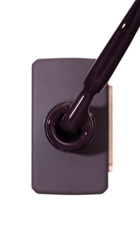 Purple nail polish bottle with brush on a white background