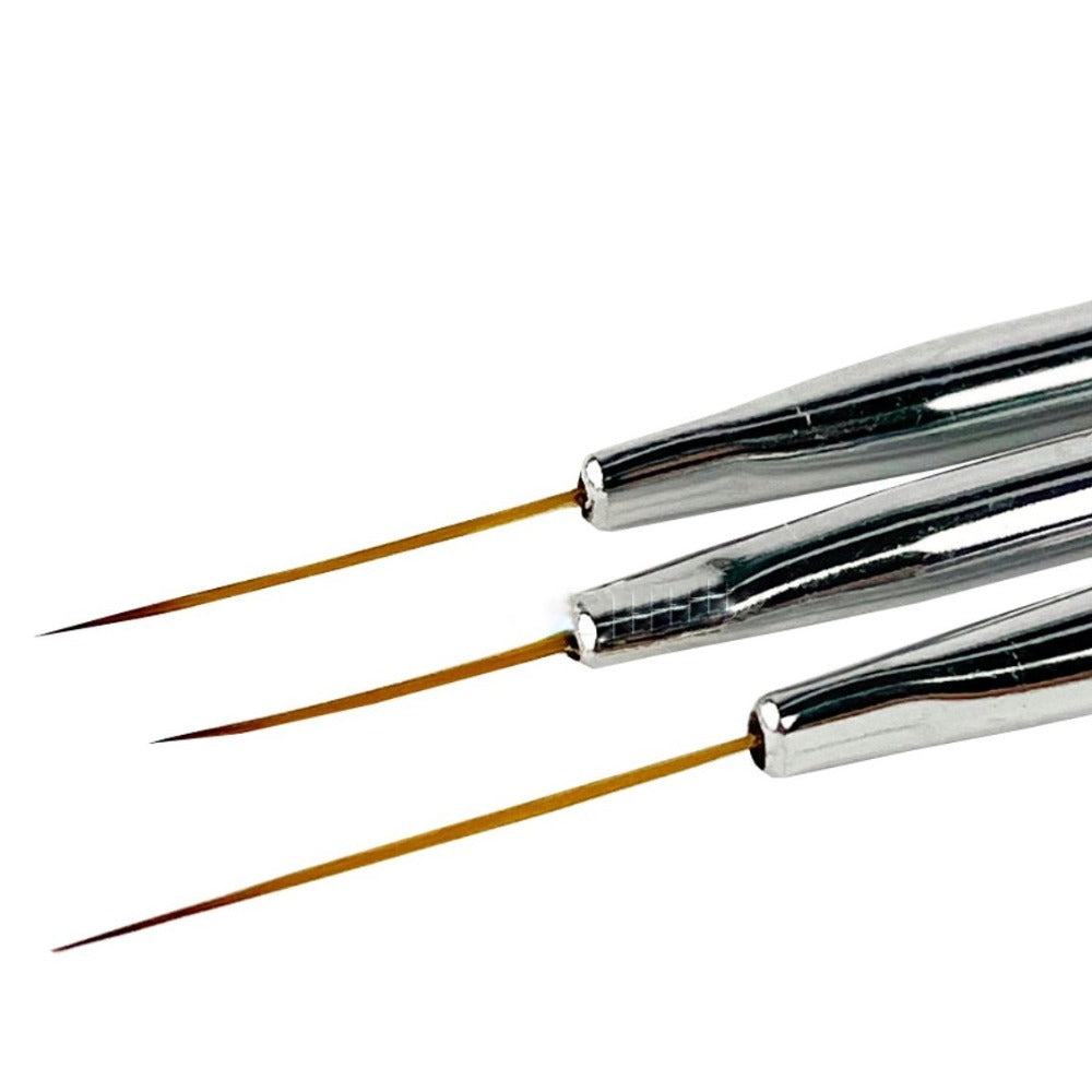 Three fine nail art liner brushes with silver handles for precise manicure design