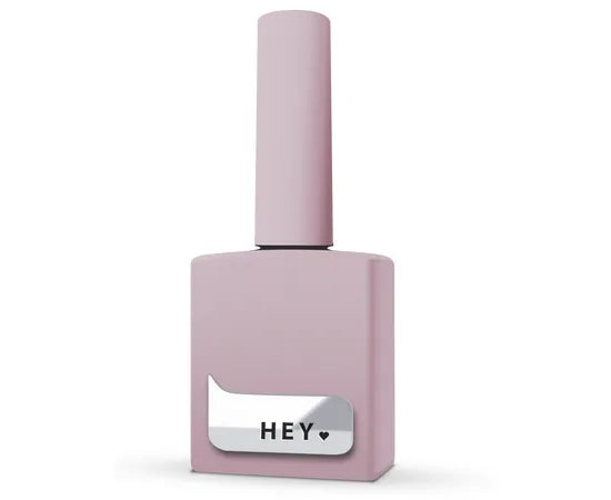 Pink gel nail polish bottle with silver label and 'HEY' text, manicure accessory.