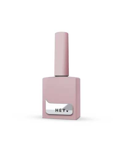 Light pink nail polish bottle with brush cap and 'HEY' label, professional manicure product