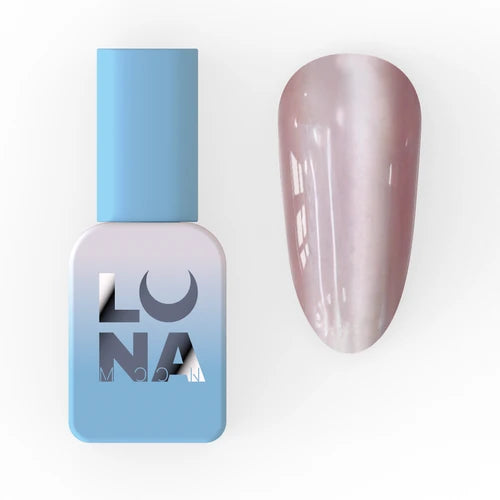 Pearlescent white gel nail polish bottle beside a painted nail swatch
