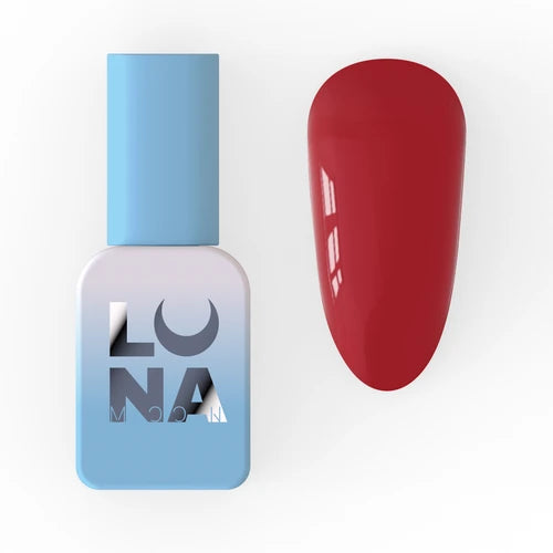 Red gel nail polish swatch and blue bottle for manicure and pedicure