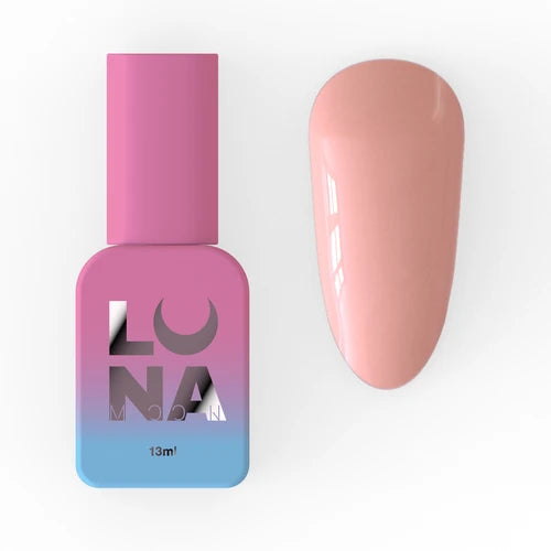 Pink and blue Luna nail polish bottle with nude gel polish swatch for manicure