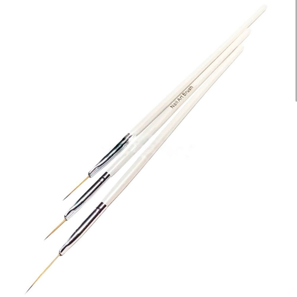 Set of three white nail art liner brushes for detailed manicure design