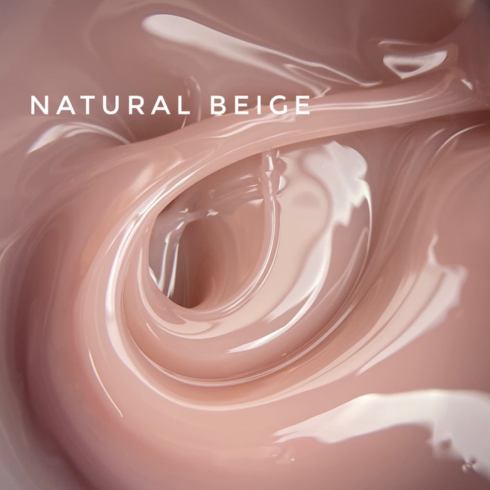 Thick, glossy swirl of natural beige UV gel nail polish, close-up texture, text overlay.